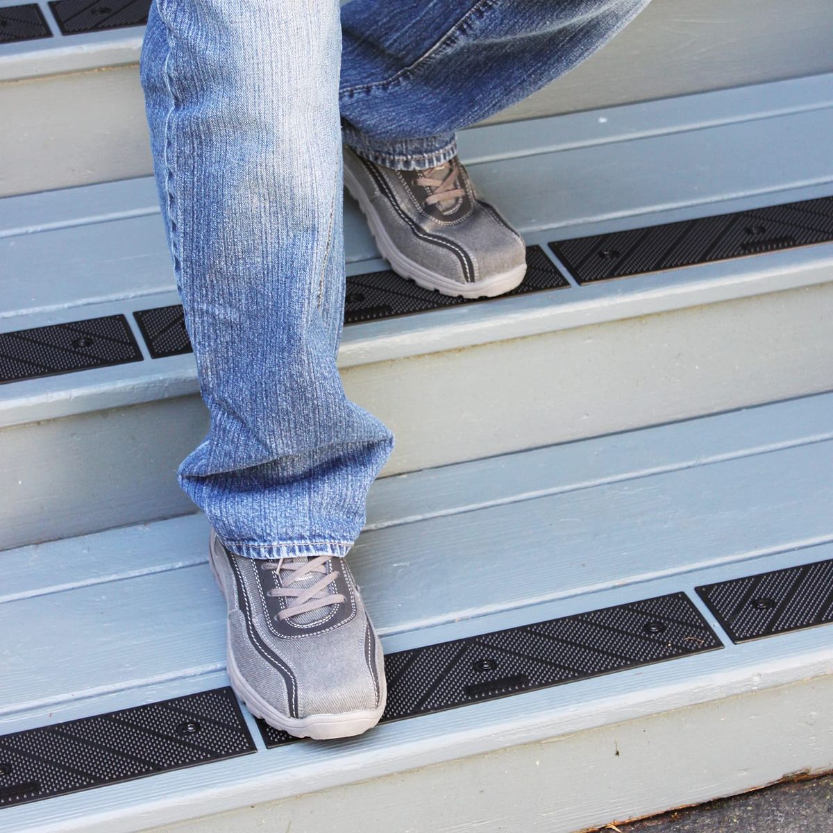 Abstract gold walking path on a dark horizon